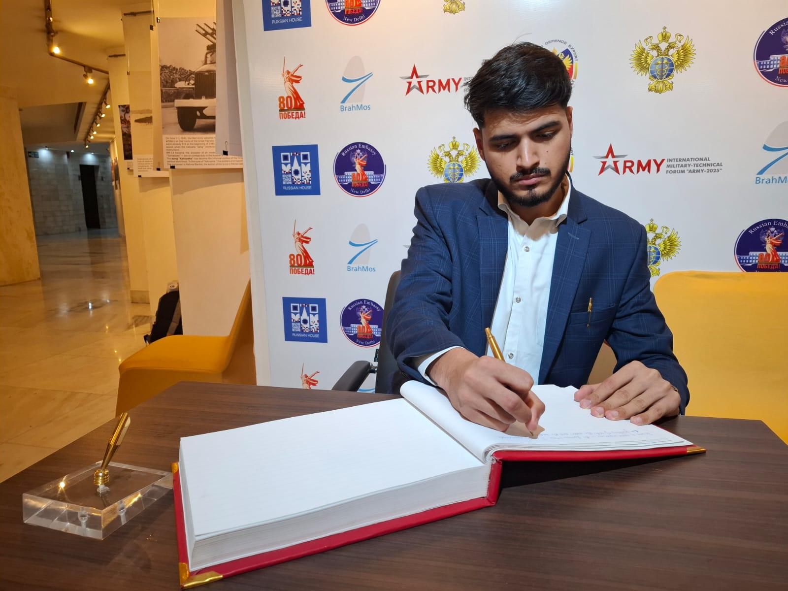 Akshat Mehrotra with the President of Iceland during a book signing.
